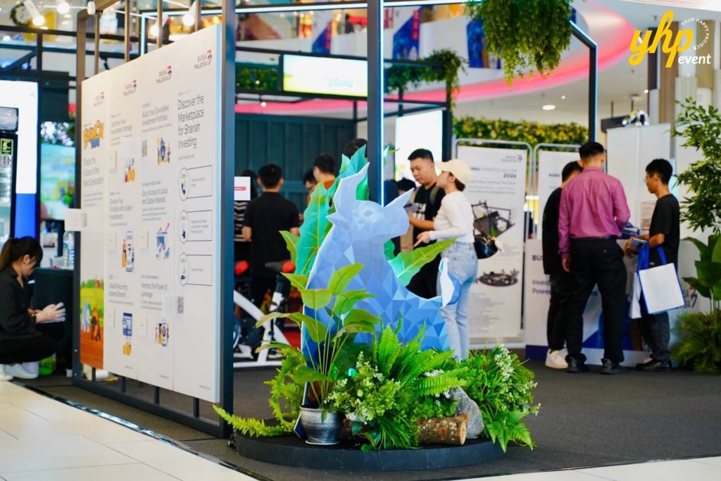 Bursa Marketplace Fair 2024: Sarawak Edition 18 Modern blue geometric bull sculpture and informational posters at the Bursa Marketplace Fair 2024