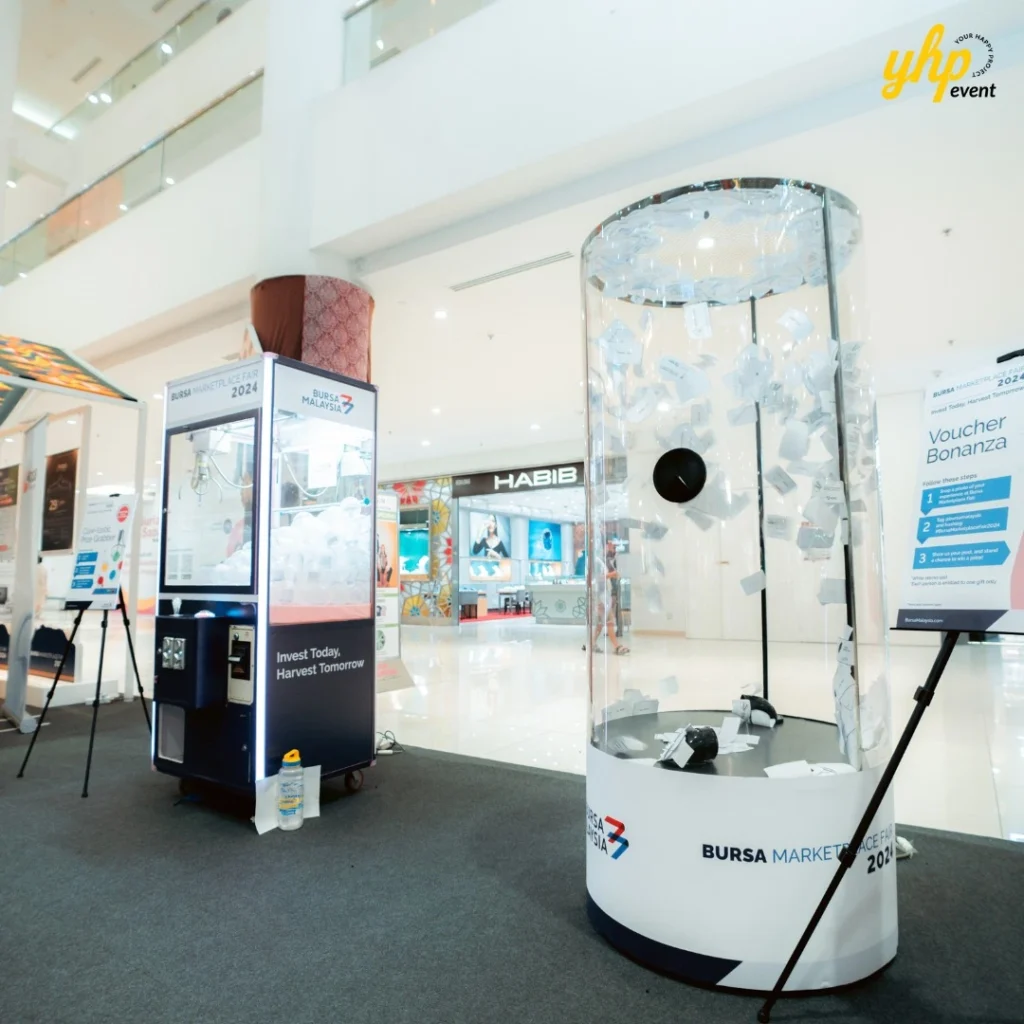 Bursa Marketplace Fair 2024: Invest Today, Harvest Tomorrow 7 Prize claw machine and lucky draw station at the Bursa Malaysia financial literacy fair for visitors