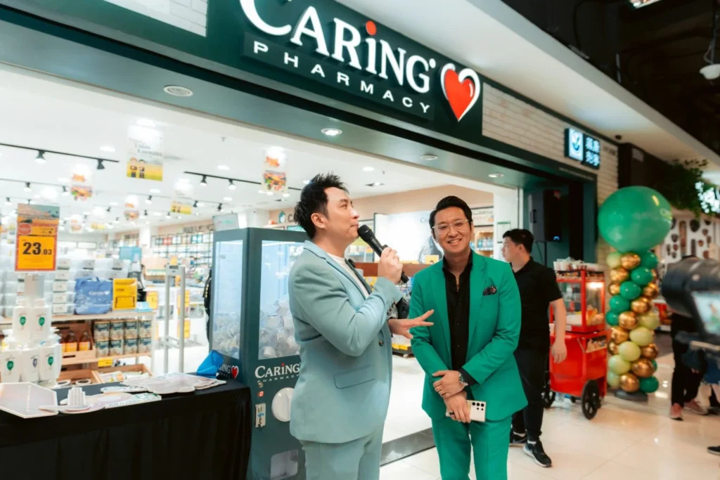 Embrace the Essence of Caring Pharmacy #Promosi Tadau Kaamatan 15 Live event hosting at a Caring Pharmacy outlet featuring promotional activities