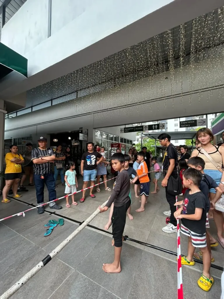 Curve25 Olumes Land : Kaamatan Celebration in Kota Kinabalu 10 Traditional tug of war competition held in a common area for residents