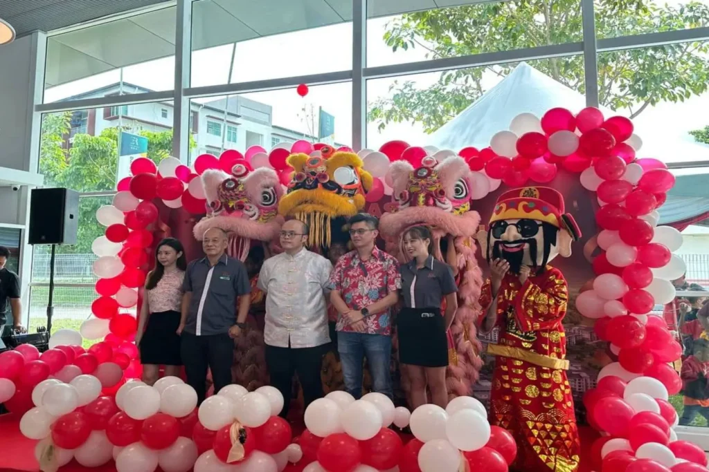 E-Residence CNY Open House cum Soft Launch 1 Group photo with lion dance troupe during the E Residence Phase 2B pre-launch Chinese New Year 2025 event