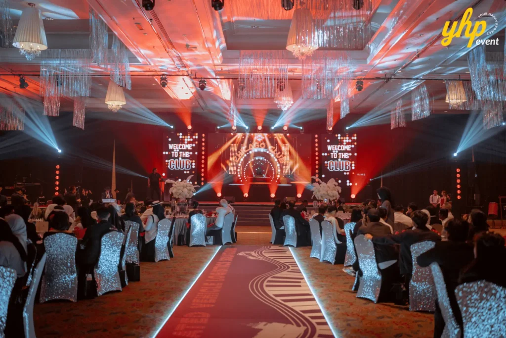 Wide ballroom view with runway and stage lighting at GMG Annual Dinner 2025 Magellan Hotel, Kota Kinabalu