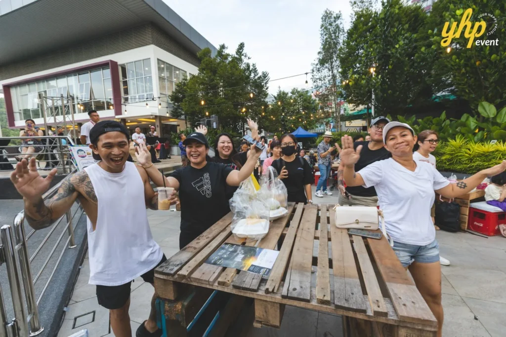 Celebrating the Grand Launch of Curve25 18 Happy residents and visitors waving at the camera