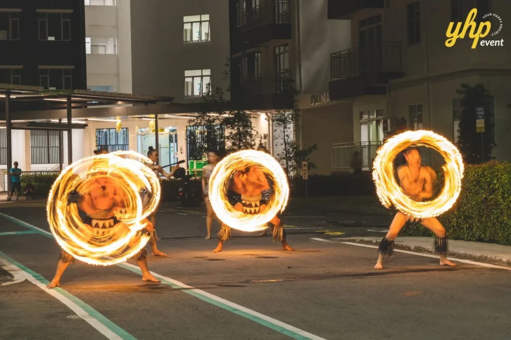 Celebrating the Grand Launch of Curve25 8 Performers creating circles of fire