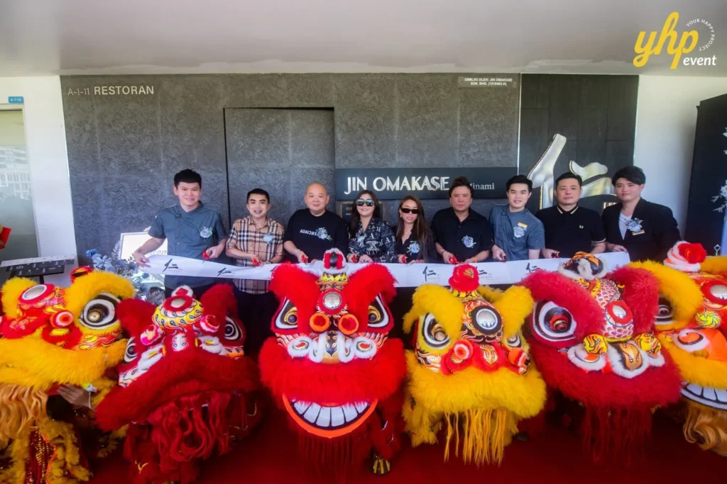 Grand Launching of JIN Omakase: A Culinary Extravaganza in Kota Kinabalu 5 Group ribbon cutting ceremony at Jin Omakase by Minami launch event with vibrant lion dance costumes and performers