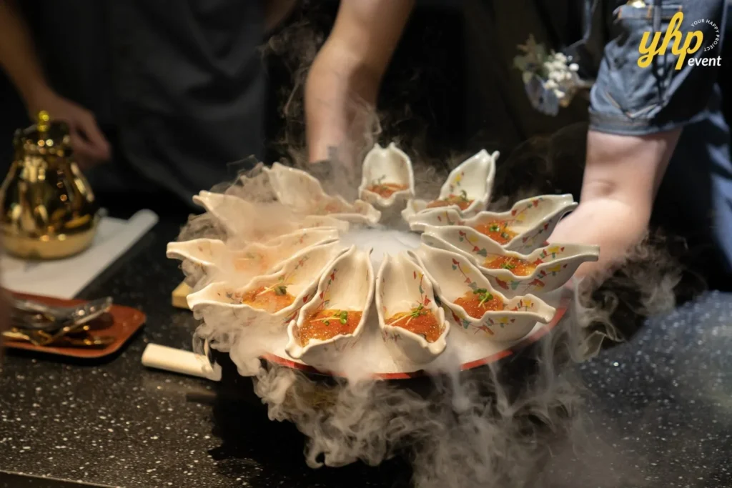 Grand Launching of JIN Omakase: A Culinary Extravaganza in Kota Kinabalu 8 Close-up of gourmet sushi dishes presented with dramatic liquid nitrogen mist