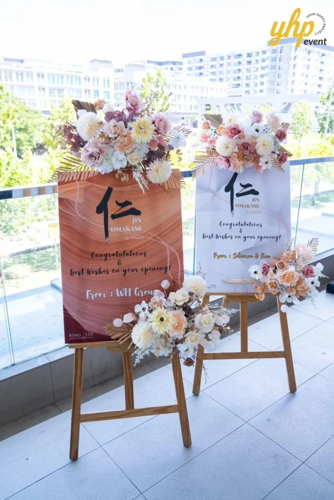 Grand Launching of JIN Omakase: A Culinary Extravaganza in Kota Kinabalu 10 Congratulatory flower stands on wooden easels