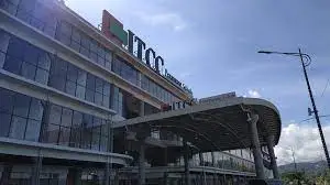 Discover the Top Event Roadshow Venues in Kota Kinabalu, Sabah 17 Exterior view of ITCC Penampang shopping mall featuring modern glass architecture under a blue sky