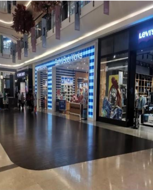 Discover the Top Event Roadshow Venues in Kota Kinabalu, Sabah 5 Bath and Body Works storefront and Levi's shop located along a wide corridor inside Imago Mall