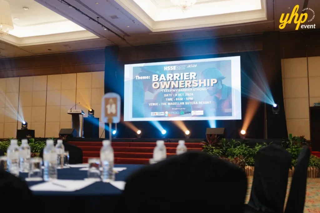 Event stage screen displaying the Barrier Ownership theme for HSSE Day 2024 at Magellan Sutera Resort