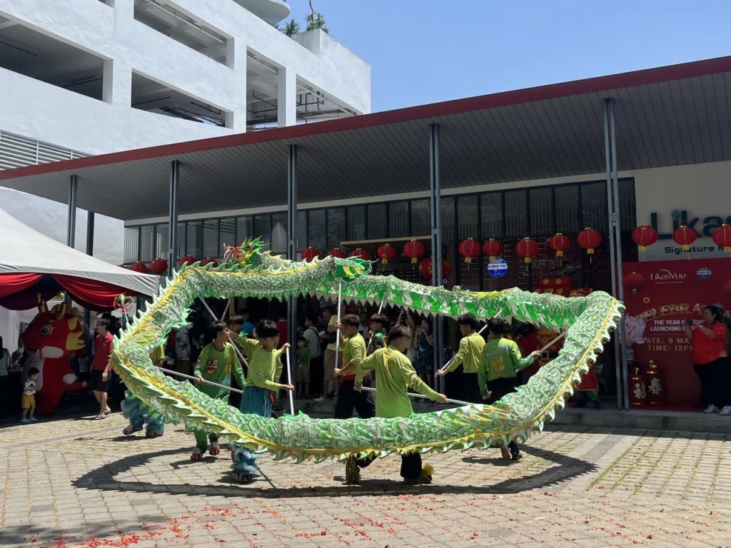 LikasVue CNY Celebration 2024 & A1 Show Unit Launching 3 Traditional green dragon dance performance at LikasVue outdoor plaza for the 2024 Chinese New Year festival