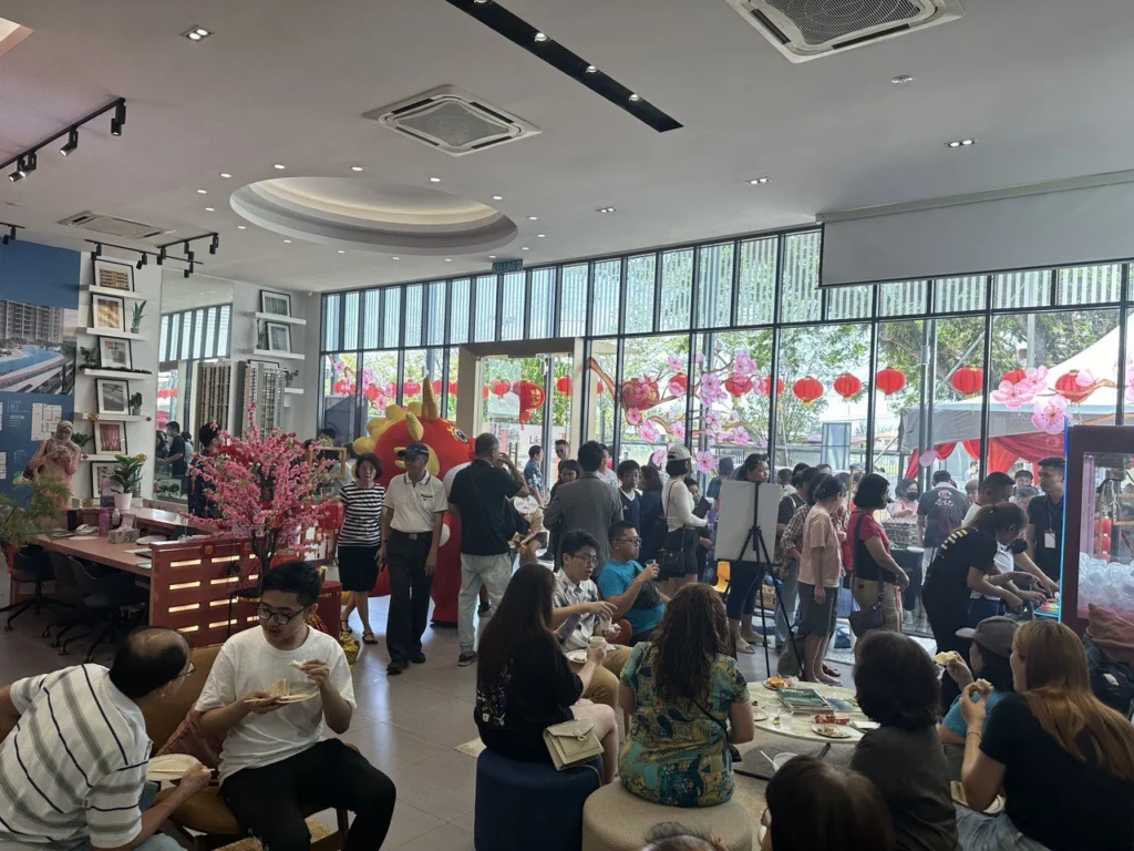 LikasVue CNY Celebration 2024 & A1 Show Unit Launching 8 Crowded interior of LikasVue property gallery during a festive open house event with food and decorations