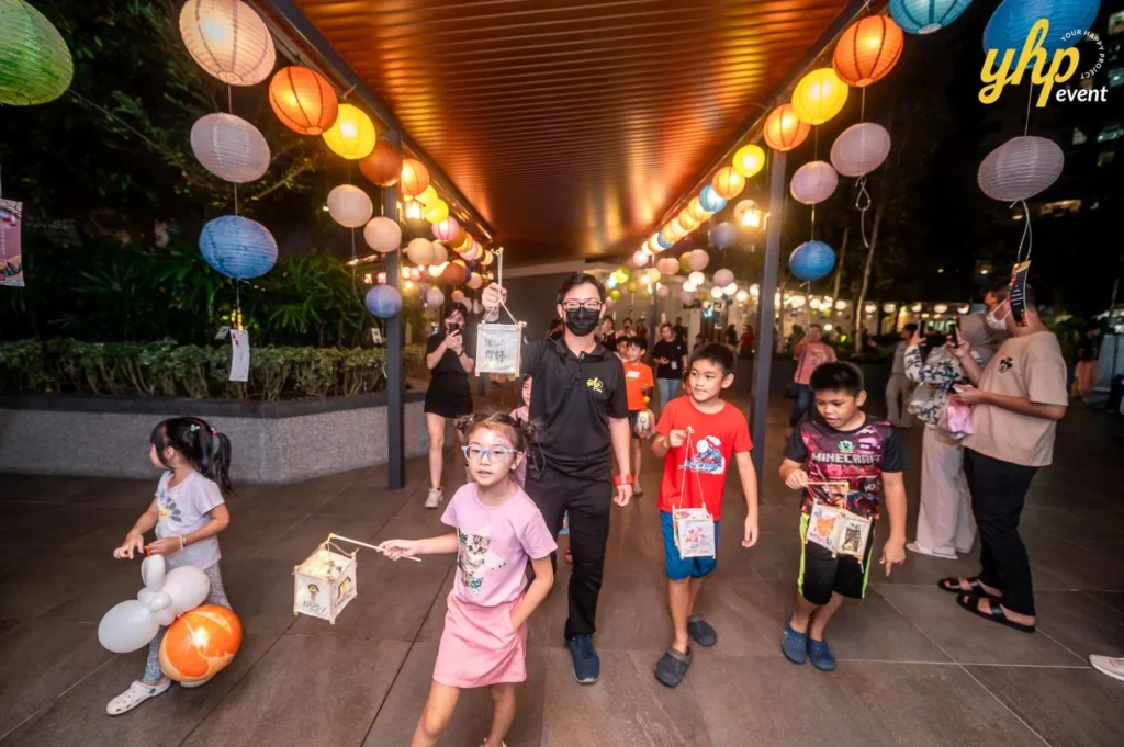 Magical Mid Autumn Gathering in Curve25 12 Kids carrying handmade lanterns during a festive Mid-Autumn Festival night walk