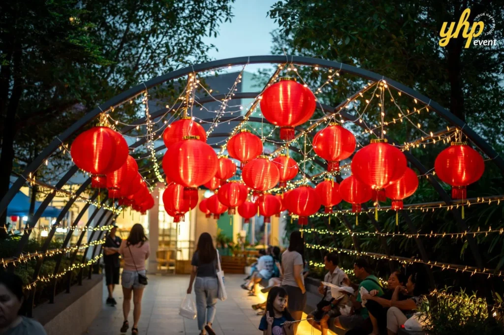 Magical Mid Autumn Gathering in Curve25 7 Rows of bright red Chinese lanterns creating a glowing tunnel for a Mid-Autumn Festival night walk
