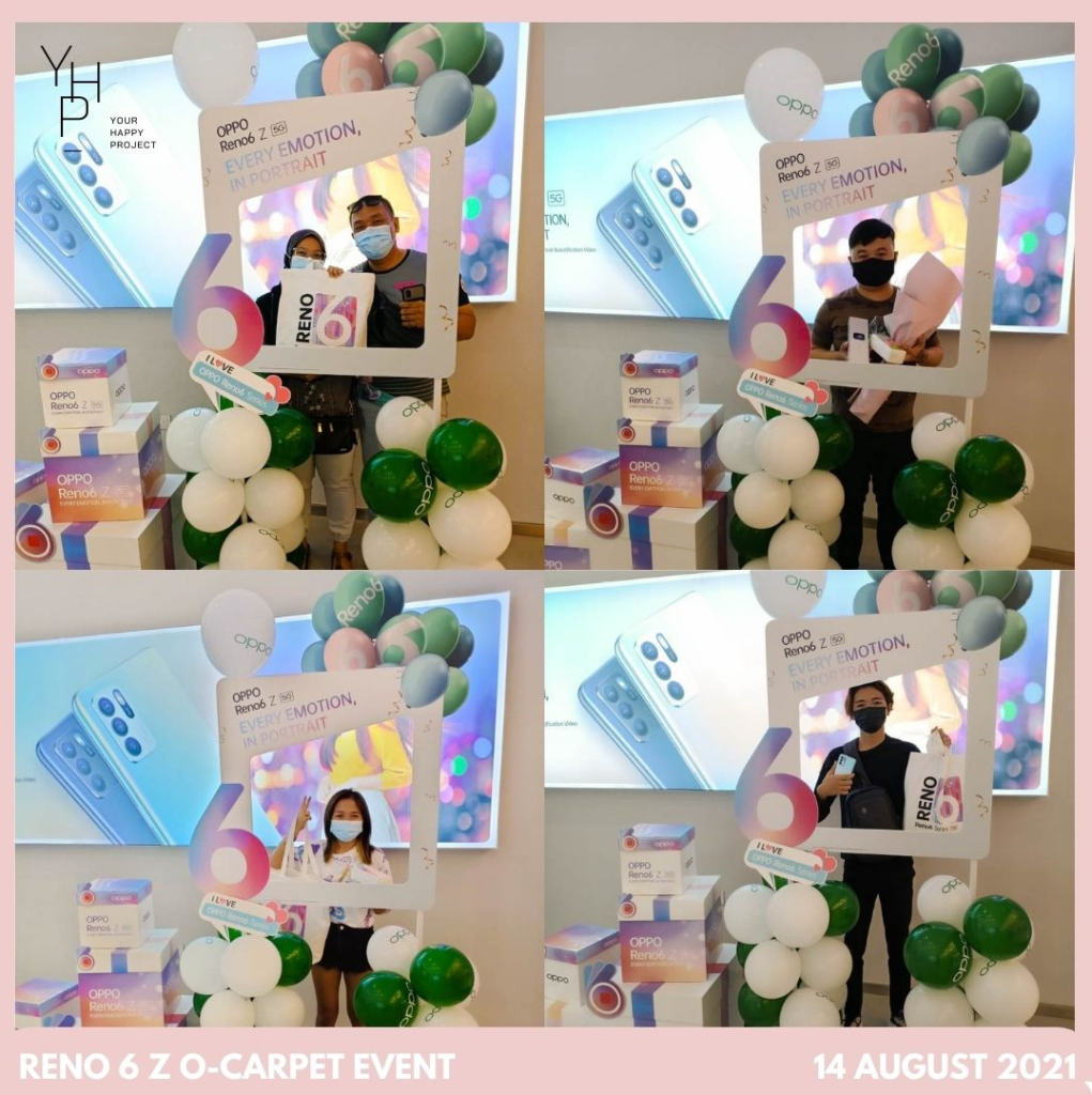 Customers posing for photos behind a Reno6 Z branded frame with balloons during an O-carpet store pickup event