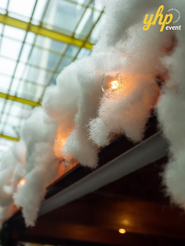Riverson - Christmas & Lunar New Year Decoration 10 Close up of warm incandescent light bulbs nestled in soft white snow for event atmosphere
