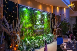 SEALA 8 - Sabah Cultural Night 2 Elegant stage backdrop with tropical jungle theme and floral decor for a SEALA gala dinner event