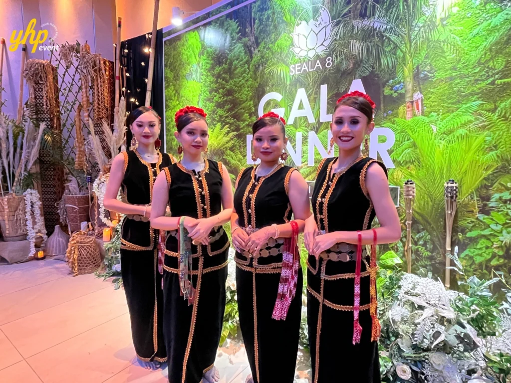 Sabah Kadazandusun Four female cultural dancers in traditional Kadazan Dusun attire posing at a SEALA gala dinner