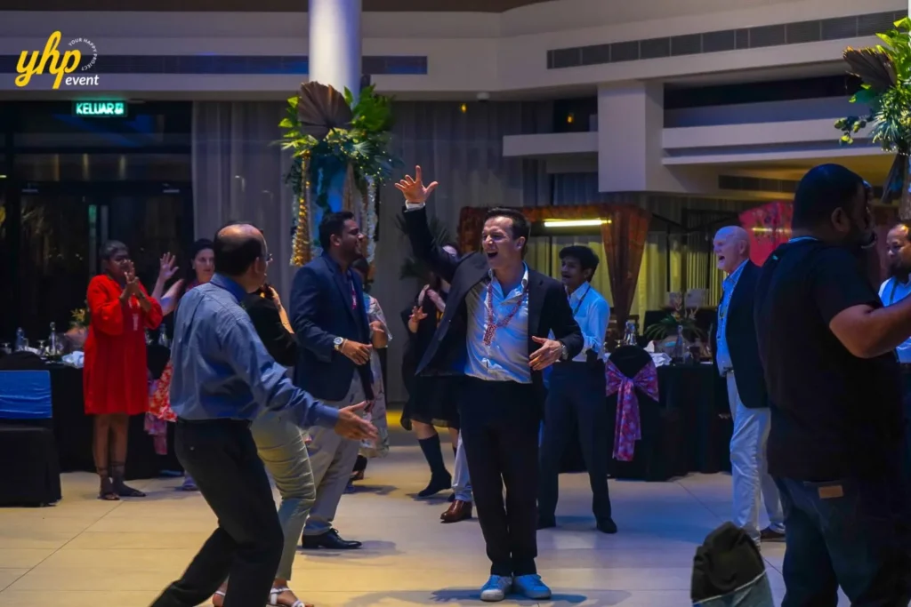 Conference in sabah International guests enjoying a lively dance floor session