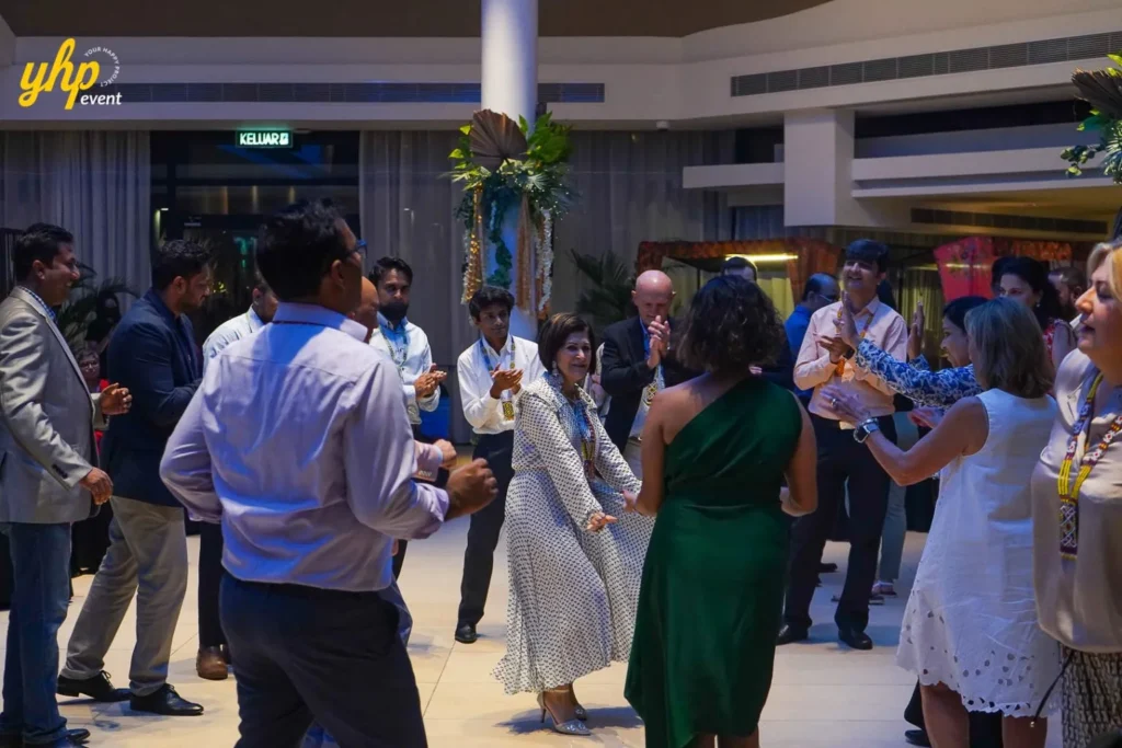 Conference in Sabah Guests and locals dancing together on a spacious ballroom floor during a cultural gala dinner night
