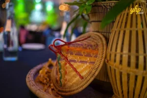 Sabah Culture Traditional Kadazan Dusun sun hat and woven bamboo baskets displayed at a cultural gala dinner