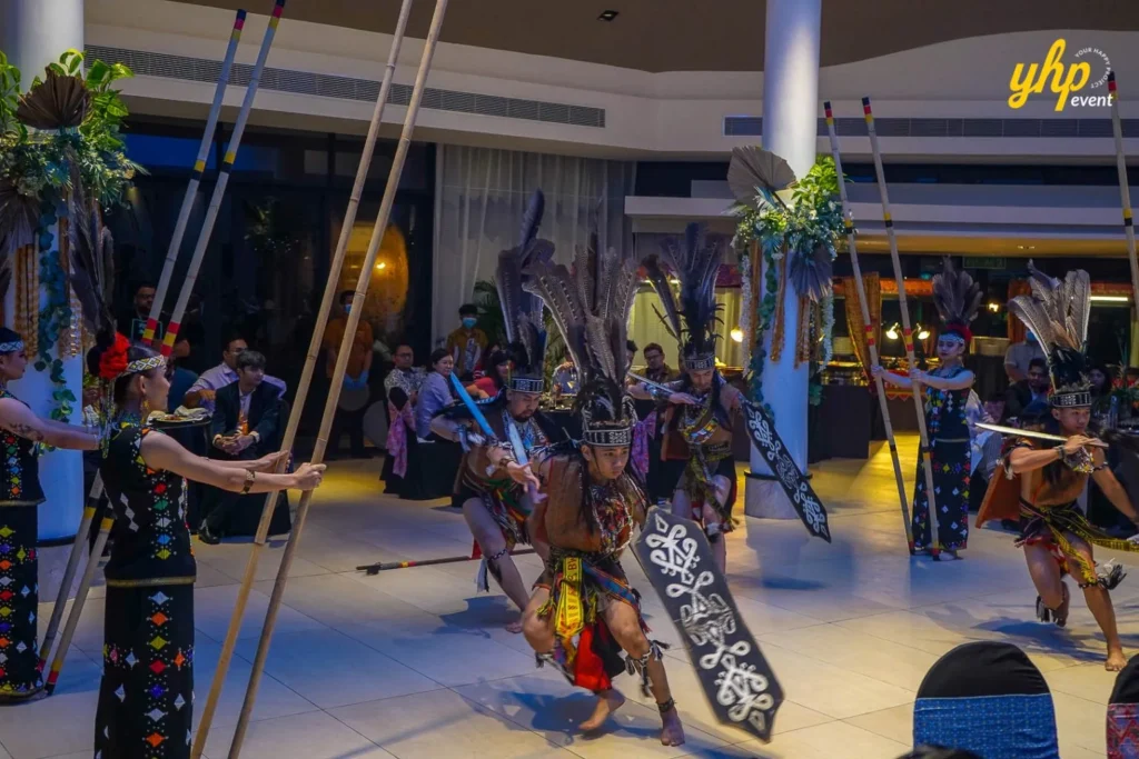 Sabah Magunatip Dance Warriors performing a traditional dance with shields and spears