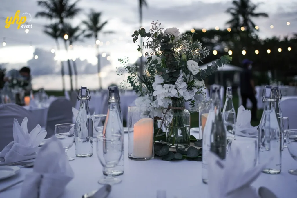 SEALA8 shangrila Rasaria Hotel Elegant table centerpiece with white flowers and candles for an elegant vibes.