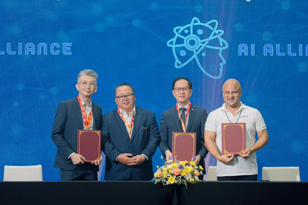 SME Expo AI Summit 2025 - Sabah International Convention Centre (SICC) 10 AI Alliance signing ceremony at AI Summit 2025 with officials holding documents on stage