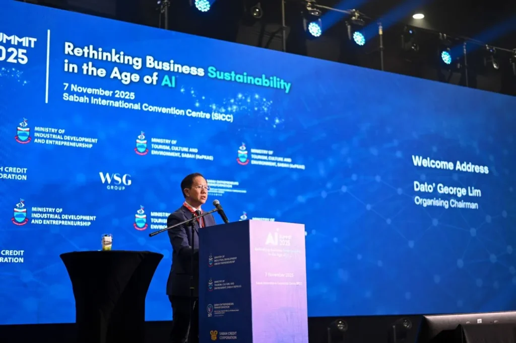 SME Expo AI Summit 2025 - Sabah International Convention Centre (SICC) 5 Opening speech at AI Summit 2025 with keynote speaker on stage before backdrop on sustainability and AI theme in SICC Kota Kinabalu