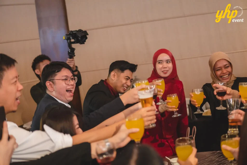 Guests enjoying drinks and networking during a formal corporate event dinner