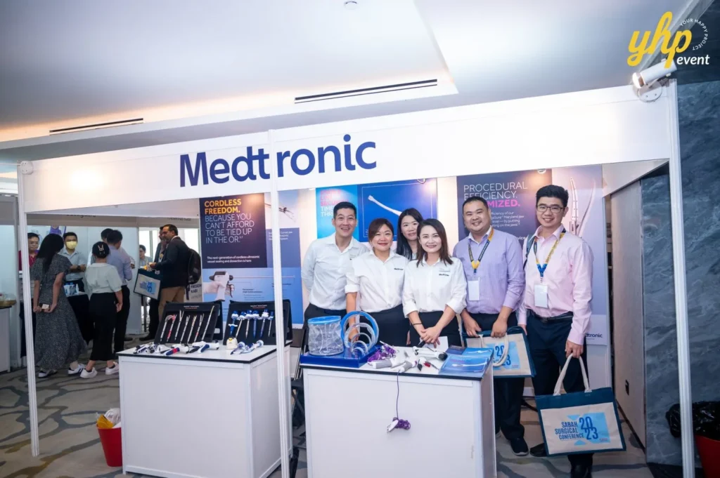 Exploring Advancements in Surgical Care: Highlights from the Sabah Surgical Conference 6 Medtronic team presenting surgical technology at their booth