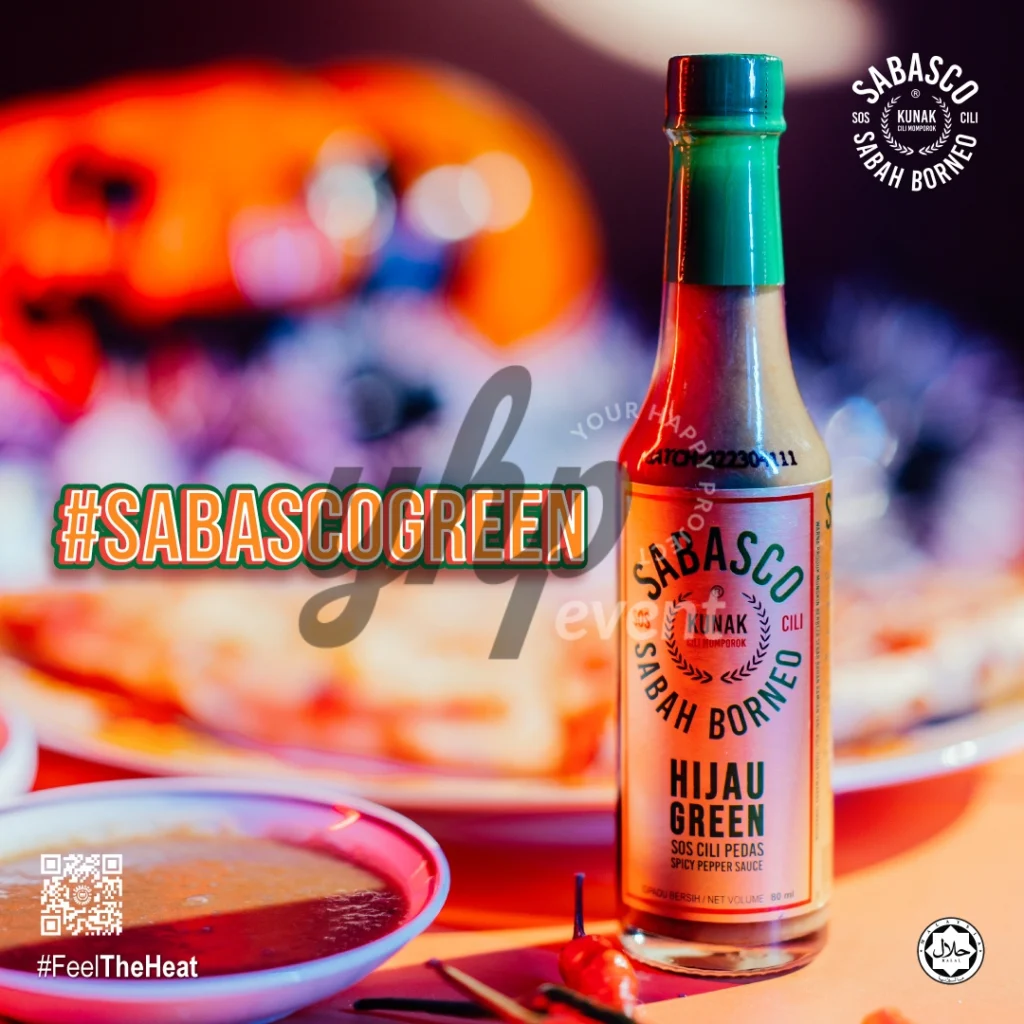 The Local Sabah Chili Sauce Brand That’s Heating Up 26 Sabasco Sabah Borneo Hijau Green chili sauce bottle beside dipping sauce and food in dramatic neon lighting