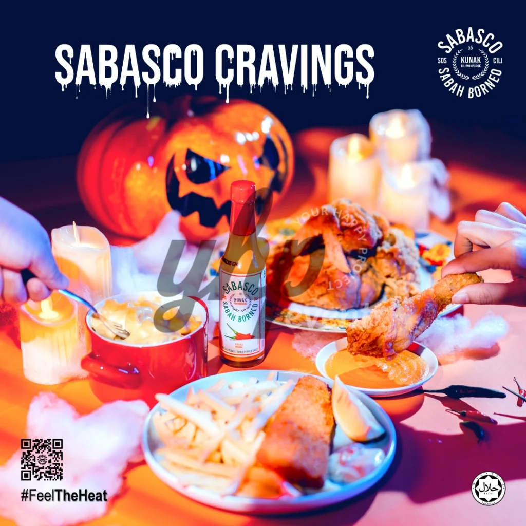 The Local Sabah Chili Sauce Brand That’s Heating Up 27 Halloween dinner table with fried chicken, fries, candles, pumpkins, and Sabasco Sabah Borneo chili sauce