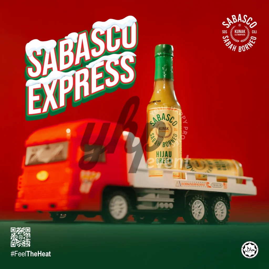 The Local Sabah Chili Sauce Brand That’s Heating Up 29 Mini toy truck carrying a Sabasco Sabah Borneo Hijau Green chili sauce bottle on a vivid red background