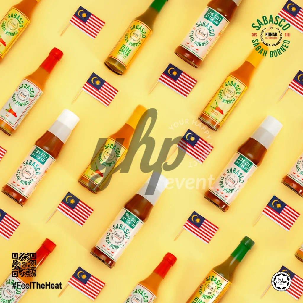 The Local Sabah Chili Sauce Brand That’s Heating Up 39 Pattern of Sabasco Sabah Borneo chili sauce bottles and miniature Malaysian flags arranged on a yellow background