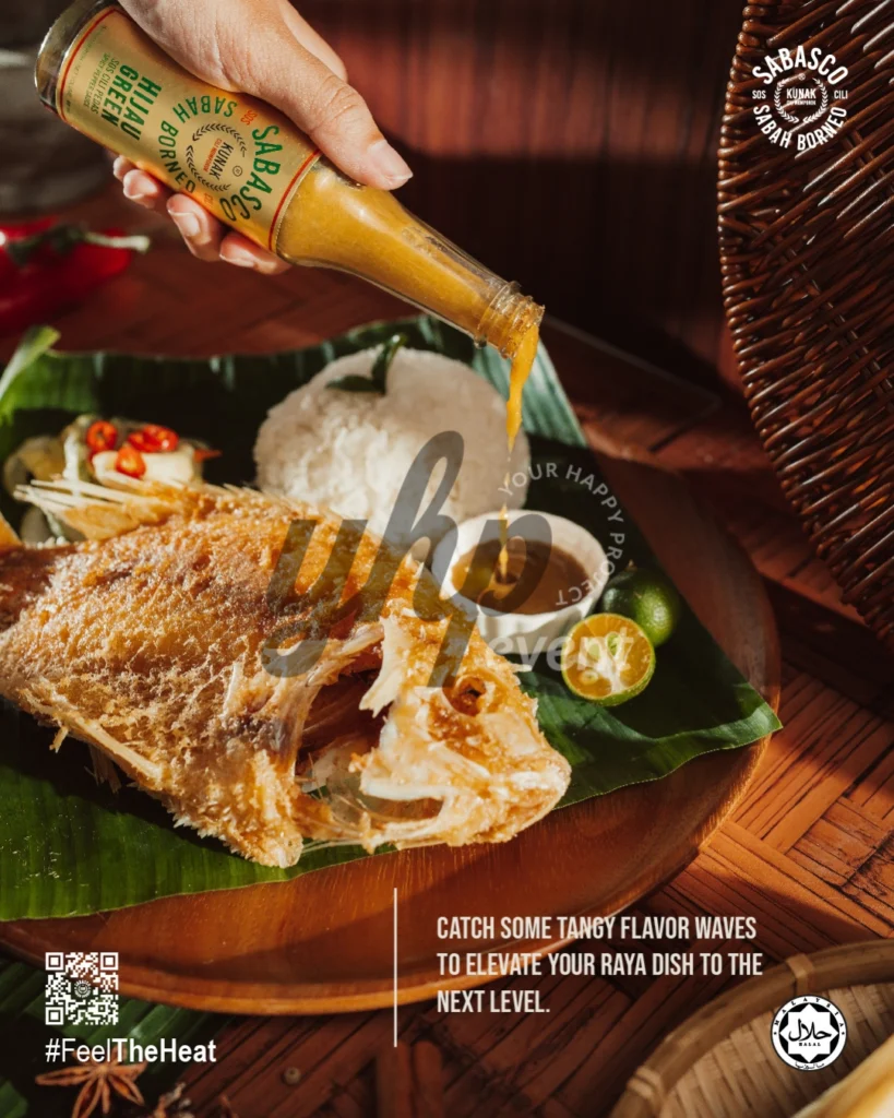The Local Sabah Chili Sauce Brand That’s Heating Up 2 Sabasco Sabah Borneo Hijau Green sauce poured over fried fish, rice, and citrus on a banana leaf platter
