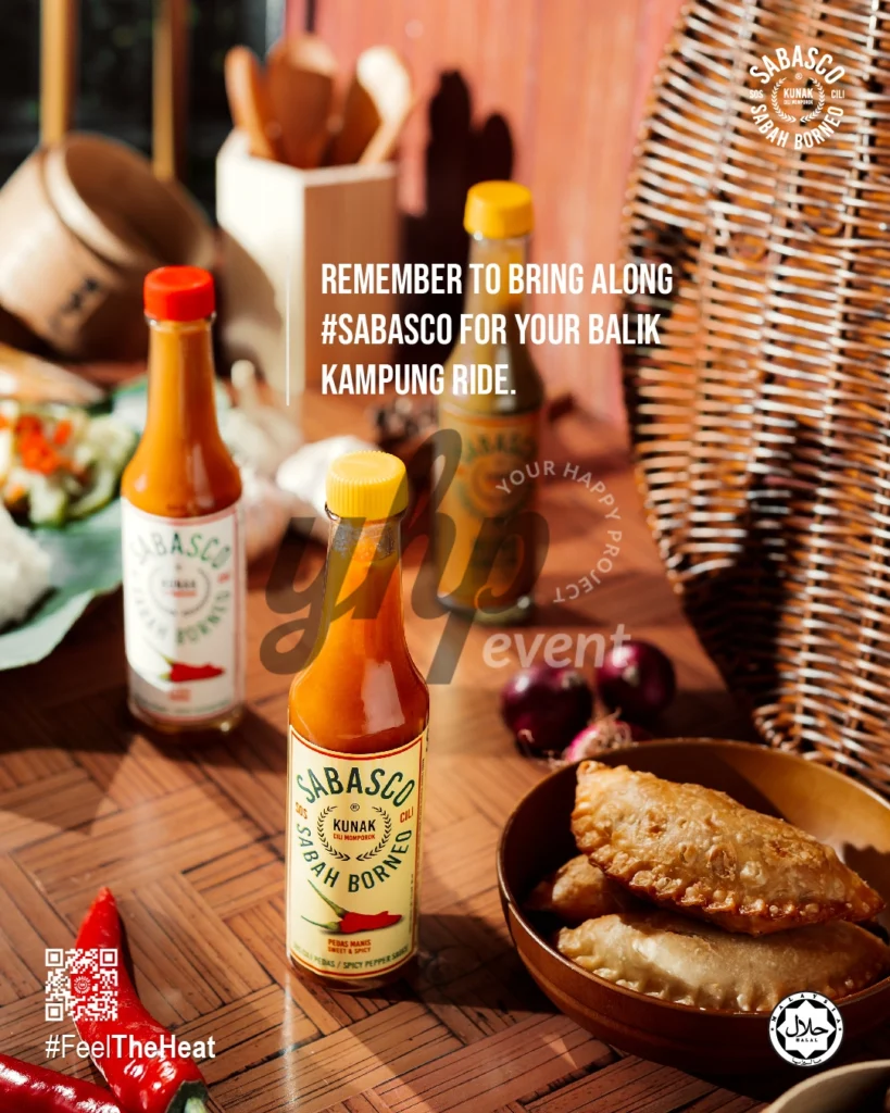 The Local Sabah Chili Sauce Brand That’s Heating Up 4 Sabasco Sabah Borneo sweet and spicy sauce beside curry puffs and chilies on a rustic wooden tabletop