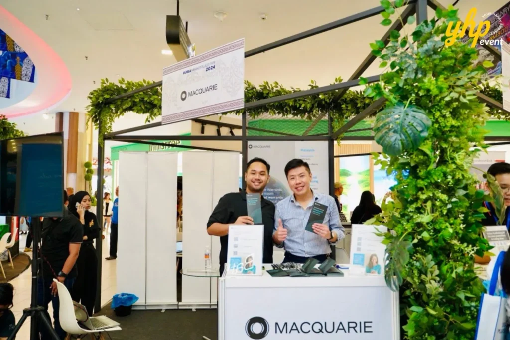 Bursa Marketplace Fair 2024: Sarawak Edition 10 Staff display financial literature at the Macquarie exhibit during Bursa Marketplace Fair 2024