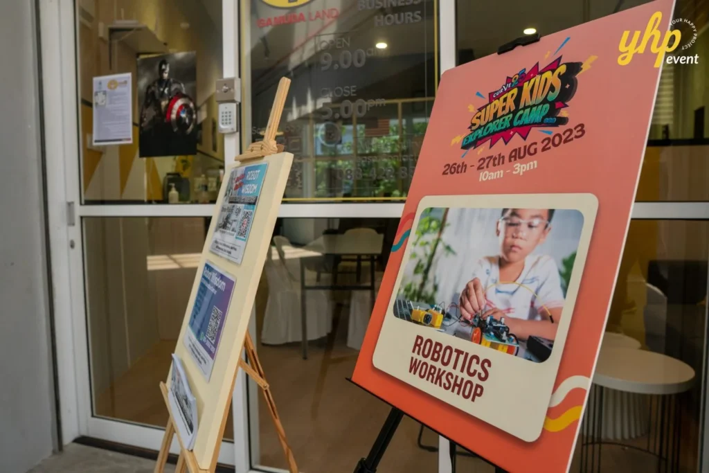 Super Kids Explorer: An Exciting Adventure at Bukit Bantayan 14 Promotional sign for a Super Kids explorer camp robotics workshop featuring event dates and times