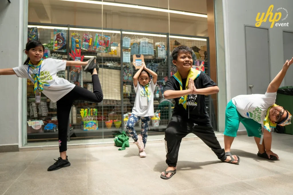 Super Kids Explorer: An Exciting Adventure at Bukit Bantayan 3 Children performing yoga and stretching exercises as part of a scavenger hunt outdoor challenge