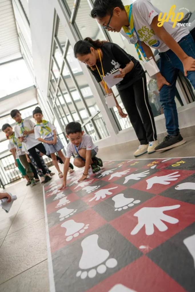 Super Kids Explorer: An Exciting Adventure at Bukit Bantayan 8 A young boy navigates a hand and foot path floor game