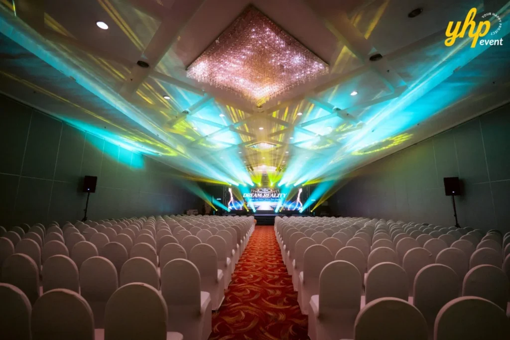 TIENS Sabah Convention l Borneo Royale Hotel Tawau 5 Empty TIENS conference hall with centered seating, crystal chandeliers and dramatic stage lighting effects in Tawau , Sabah
