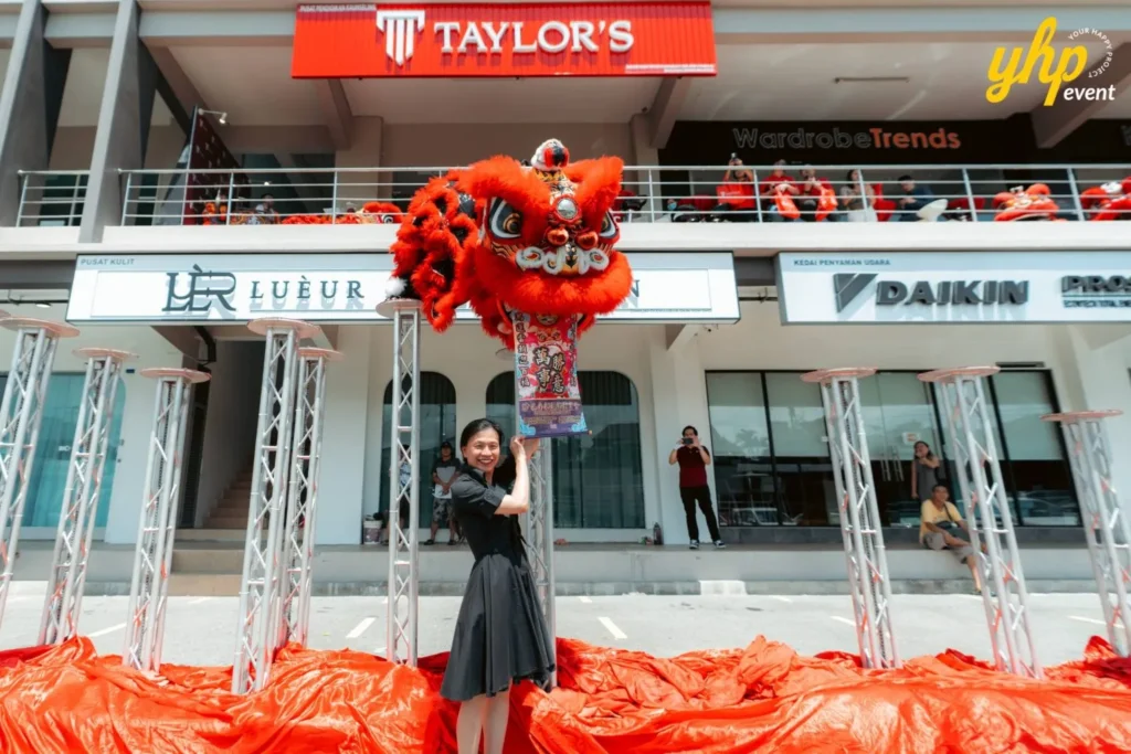 Grand Opening of Taylor's Sabah Counseling Centre 2 Outdoor lion dance performance on high poles for the Taylor's Education Counseling Centre official launch