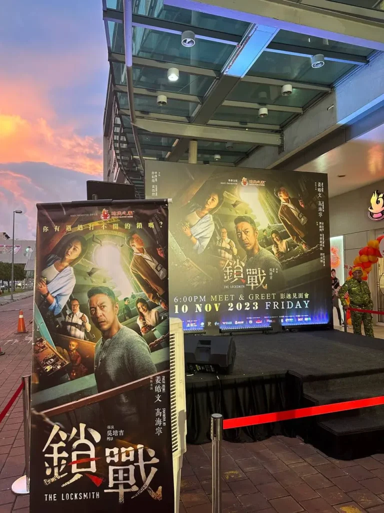 The Locksmith x Chicken Claypot Sabah Meet & Greet 5 Outdoor stage setup for The Locksmith movie meet and greet at Imago Mall featuring large promotional film banners