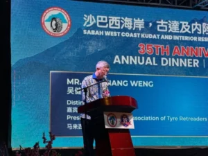 Tyre Association 35th Anniversary Celebration in Kota Kinabalu 4 Guest speaker stands at the podium delivering remarks during the 35th anniversary annual dinner program