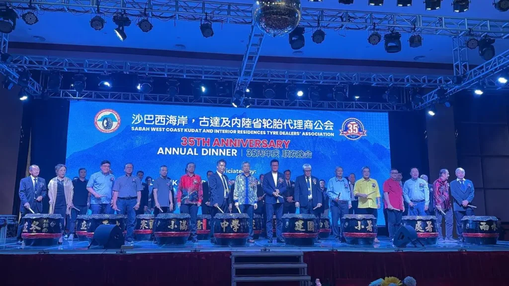 Tyre Association 35th Anniversary Celebration in Kota Kinabalu 5 Wide view of association leaders on stage behind ceremonial drums at the 35th anniversary annual dinner at Hakka Hall Kota Kinabalu