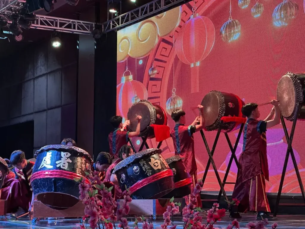Tyre Association 35th Anniversary Celebration in Kota Kinabalu 6 Chinese drum from KK High School ensemble performs in front of a red lantern themed LED backdrop during a ballroom stage show