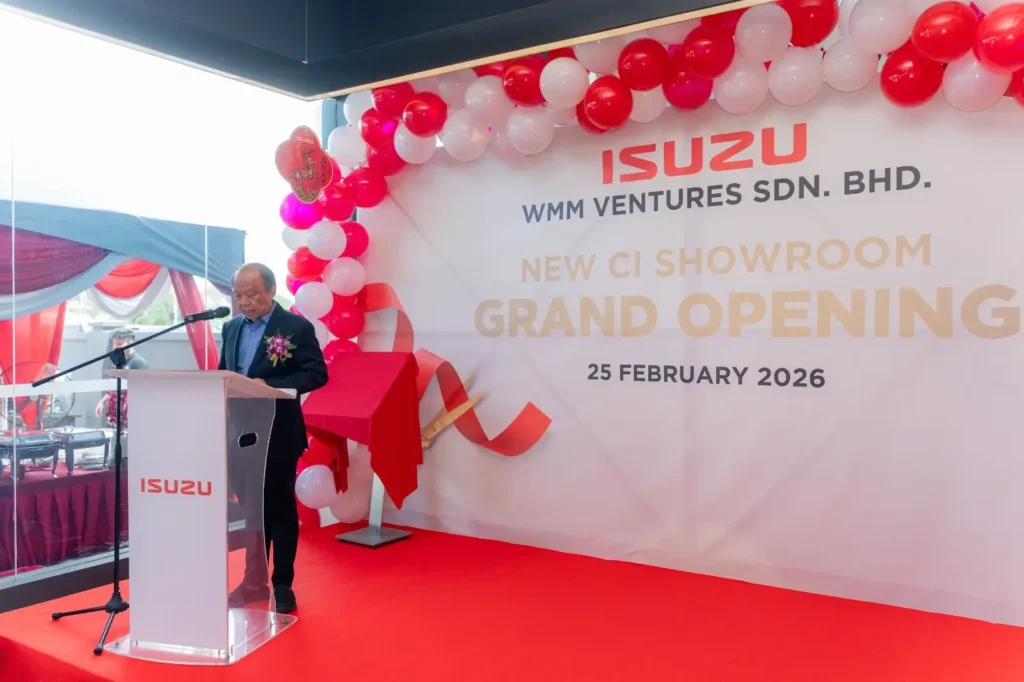 Isuzu Showroom Likas, Kota Kinabalu Launching 5 Speaker at podium during Isuzu Showroom Likas, Kota Kinabalu Launching with grand opening backdrop stage
