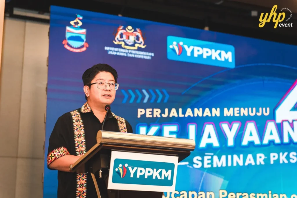 Empowering Entrepreneurs: YPPKM Small Business Seminar in Kota Kinabalu 12 Ewon Benedick gives the opening speech at the YPPKM seminar for SMEs