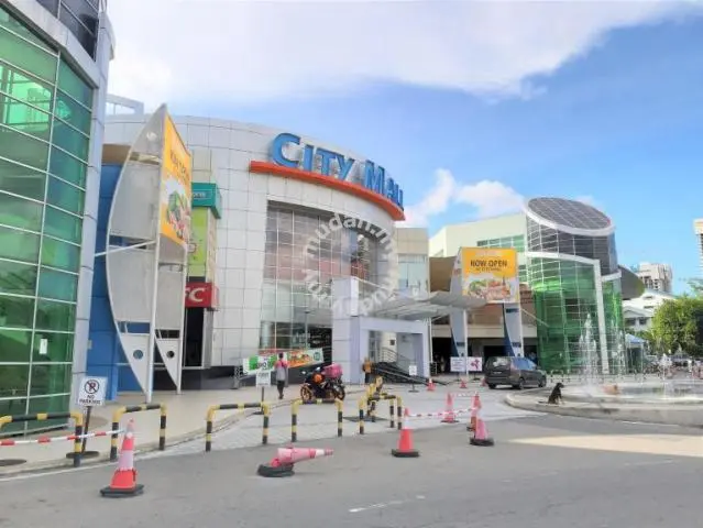 Discover the Top Event Roadshow Venues in Kota Kinabalu, Sabah 14 Exterior view of City Mall shopping center entrance with green glass architecture